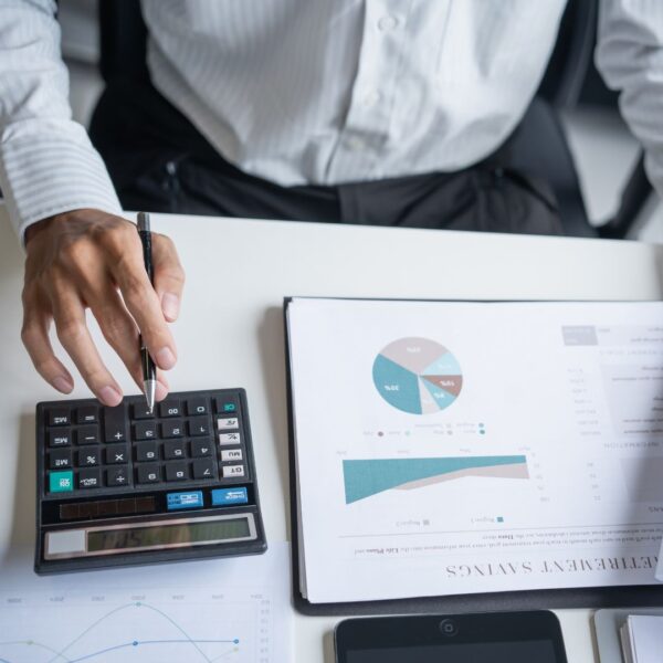 a shop owner calculating their revenue